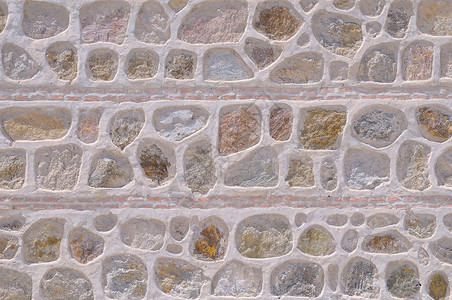 用水泥砌成的石头和砖墙背景图片