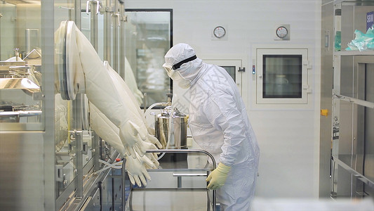 制药厂的工人在制药厂内工作的实验室技术员医药制造制药机的图片