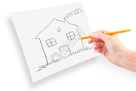 女人的手绘铅笔白纸上的梦想之家图片
