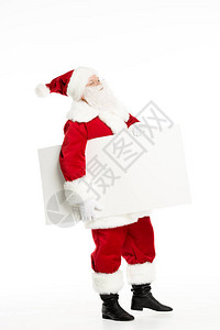 手拿着白板的圣诞老人背景图片