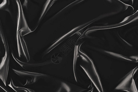 全画幅黑色素雅丝绸布为背景背景图片