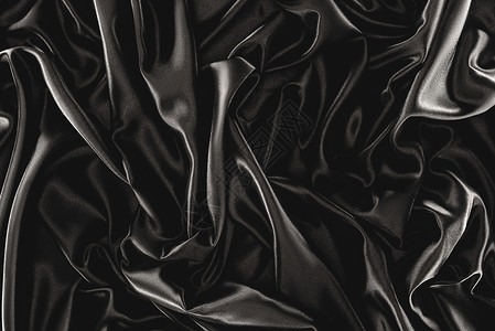 全画幅黑色素雅丝绸布为背景背景图片