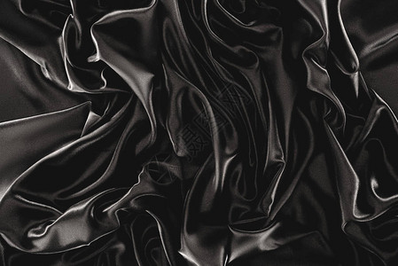 全画幅黑色素雅丝绸布为背景图片