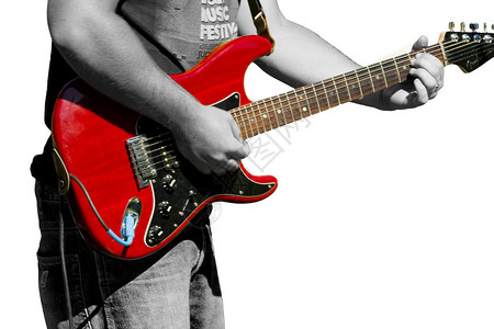 摇滚与他的吉他反对白色背景图片