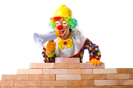 小丑砌砖的坏建筑理念背景图片