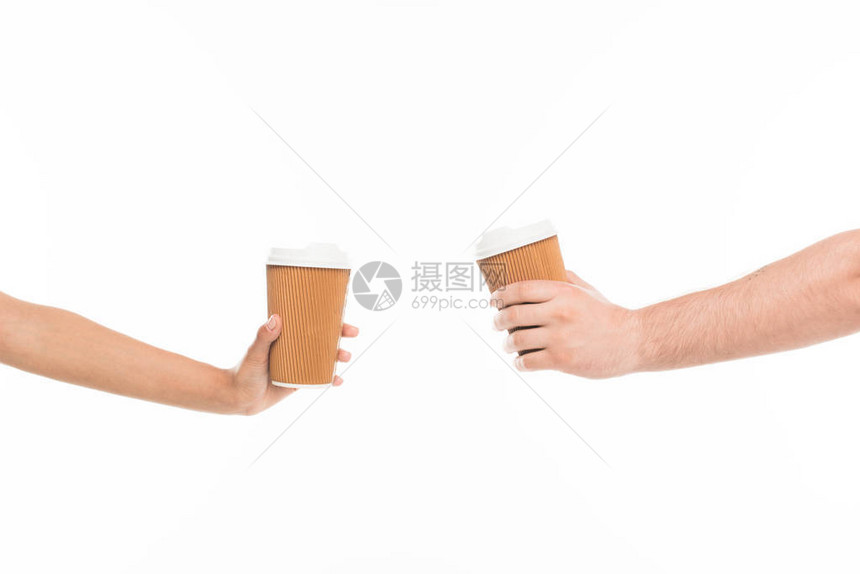 近距离收成的两只手握着可支配杯子在图片