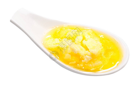 融化的酥油澄清的黄油乳脂一勺图片