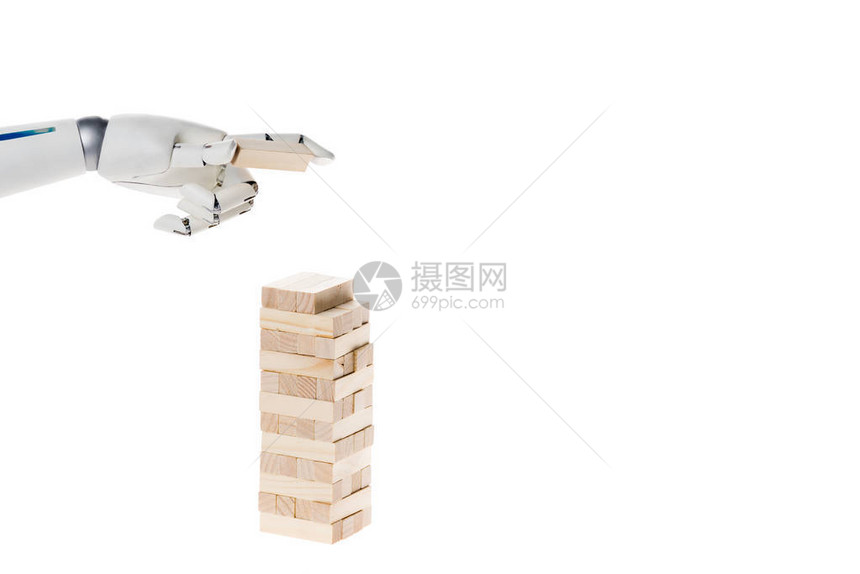 孤立在白色上的机器人玩铁块图片