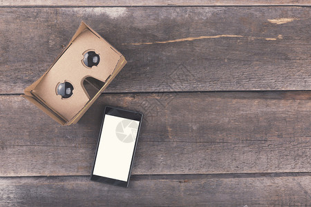 假木背景带空白智能手机的虚拟现实眼镜图片