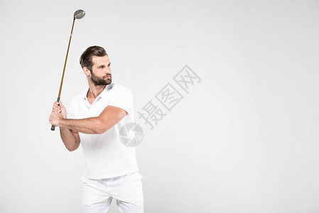 白运动装和高尔夫俱乐部的打高尔夫球员困惑图片