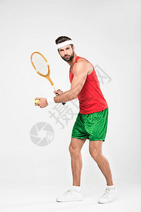 运动员打网球用复式木棍和球来打网球图片