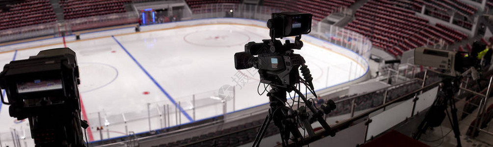 体育曲棍球宫的电视摄像机图片