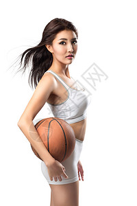 带篮球的年轻亚洲女图片