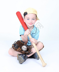 拿着球手套棒球的年轻男孩图片