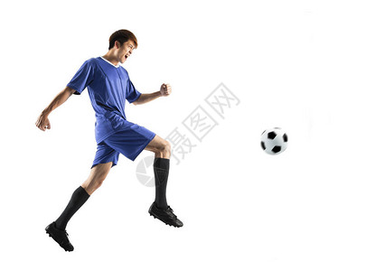 在动作中的足球运动员图片