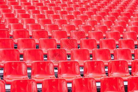 在一个体育场的清亮红色塑背景图片