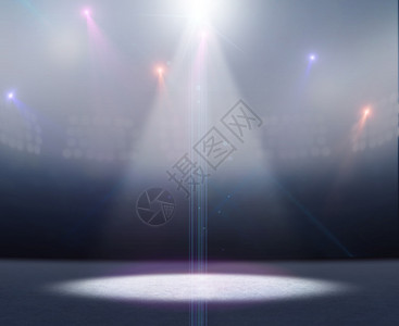 一个通用的冰场体育场在明光的泛光大灯图片