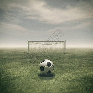 绿草上的足球和空的足球门这是一个3图片