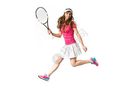 微笑着的年轻女子在打网球图片