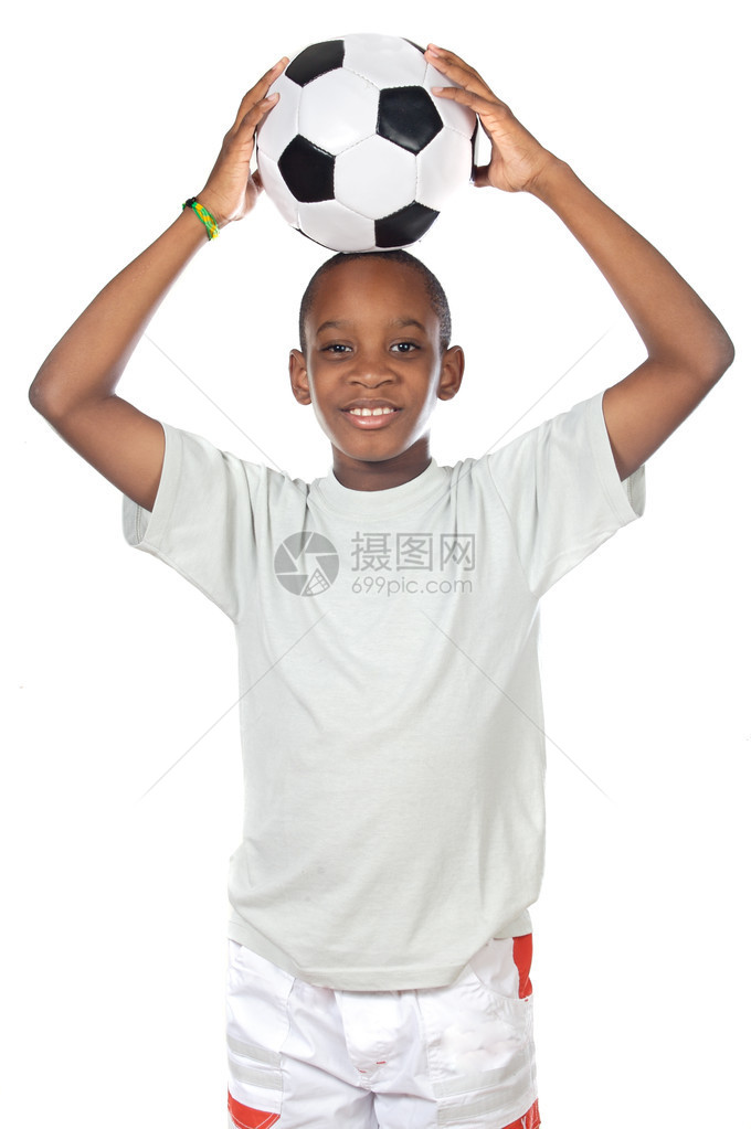 可爱的男孩拿着足球在头图片