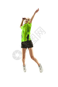 在演播室打羽毛球的一个白种人少女青少年球员在运动中被图片