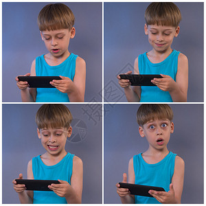 安卓游戏素材电影演播室拍到一个小孩在平板电脑上背景