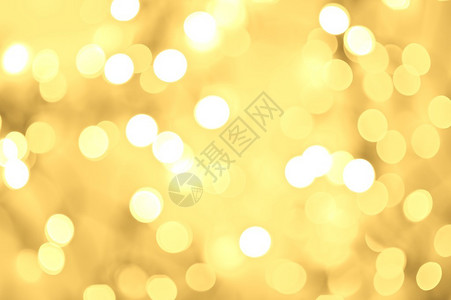 金色散景背模糊的金色背景模糊的灯光图片