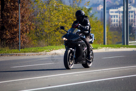 摩托车赛车手背景图片