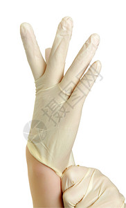 手戴着白色的医用手套图片