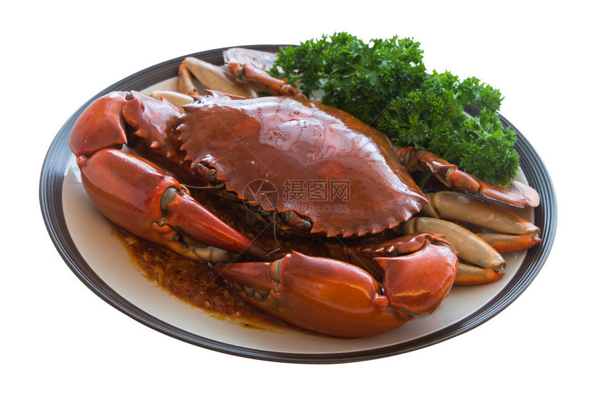 一盘大螃蟹搅拌辣椒装饰亚洲菜白图片