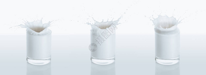 三杯装满牛奶喷水的玻璃杯白图片