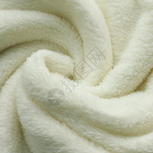 一个温暖白色外白的毛毯被旋转成图片