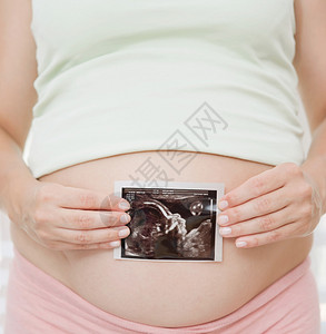 特写一个孕妇中间身体部分的详细视图高清图片