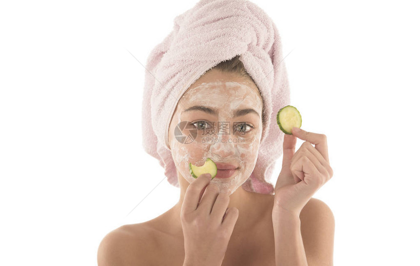 美容程序护肤理念将面部泥面膜涂在脸图片