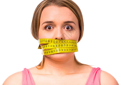 胖女人对身体不满意饮食不满意身体测量孤图片