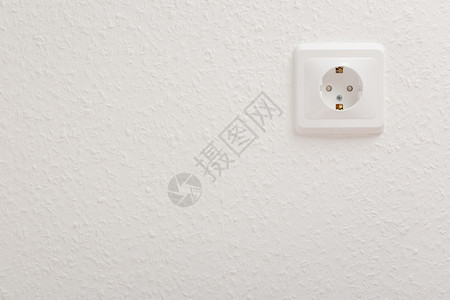 白墙上的单空电插座图片
