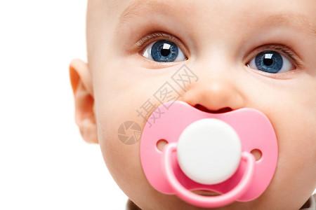 可爱婴儿的脸嘴里有奶图片