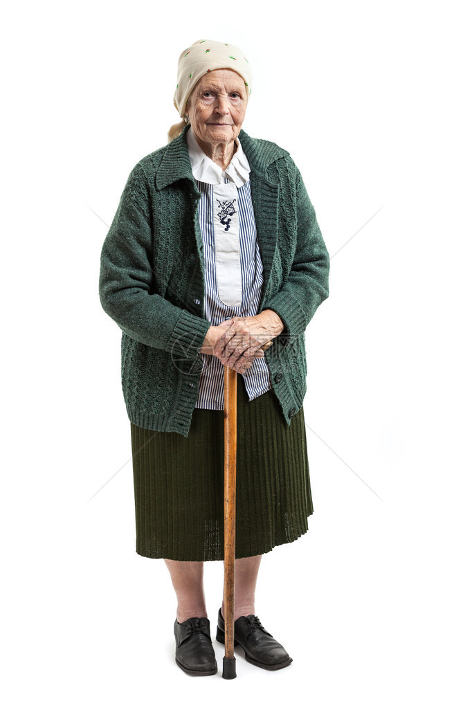 白色背景上拄着拐杖的老妇人图片