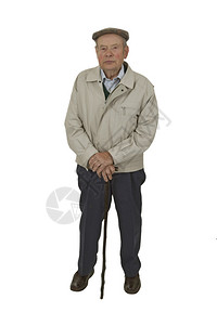 一个老人走着棍子图片
