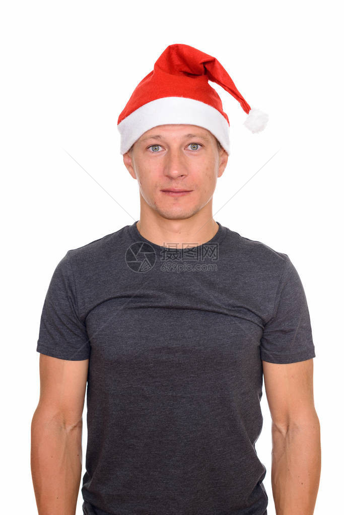 电影演播室拍摄年轻英俊的白人男子准备迎接圣诞节在白色图片