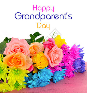 喜悦的祖父母节礼物粉红木桌上花朵多图片