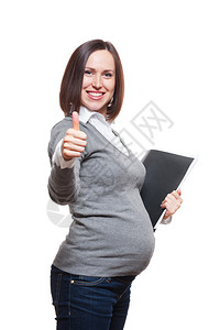 工作时怀孕妇女举起大拇指在白种图片