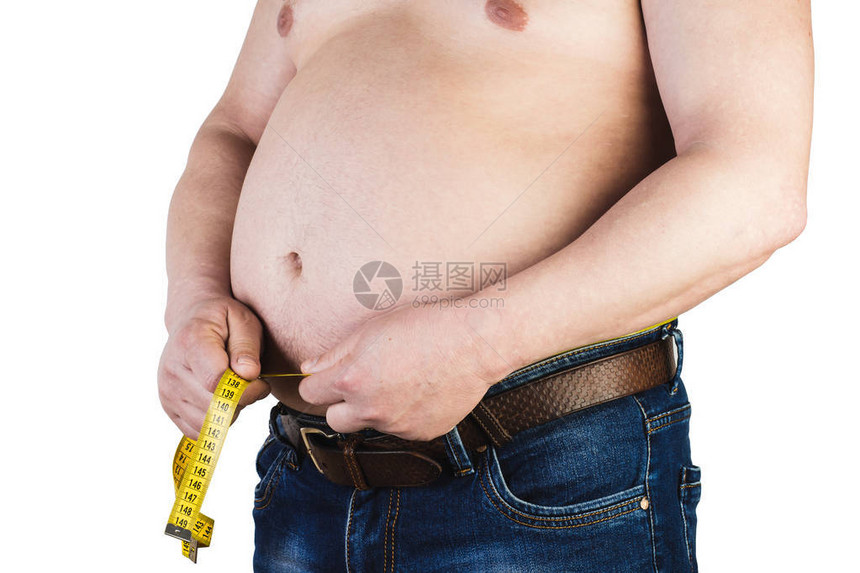 长大的人用测量磁带测量肚子的腹部图片
