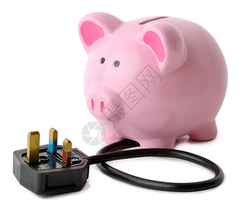节省能源的概念一个小猪银行用白色背景的插头图片