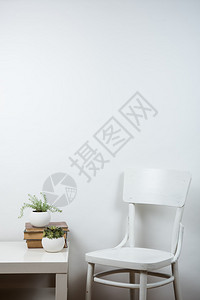 白椅子和空墙背景室内壁画海图片