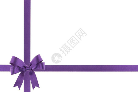 白色背景上有蝴蝶结的紫色丝带图片