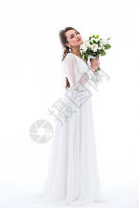 梦想中的新娘穿着婚纱花束的装扮背景图片