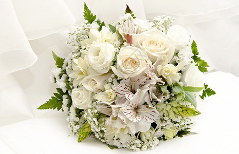 新娘婚礼的玫瑰和兰花束图片