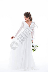 穿着优雅白色礼服的黑褐色新娘背景图片