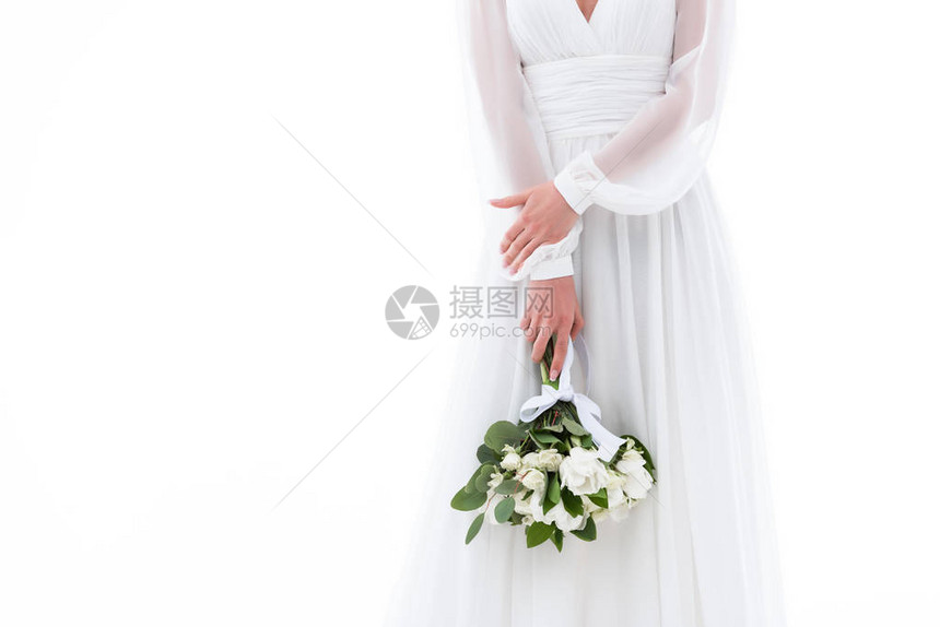 穿着优雅礼服和婚礼花束的新娘图片